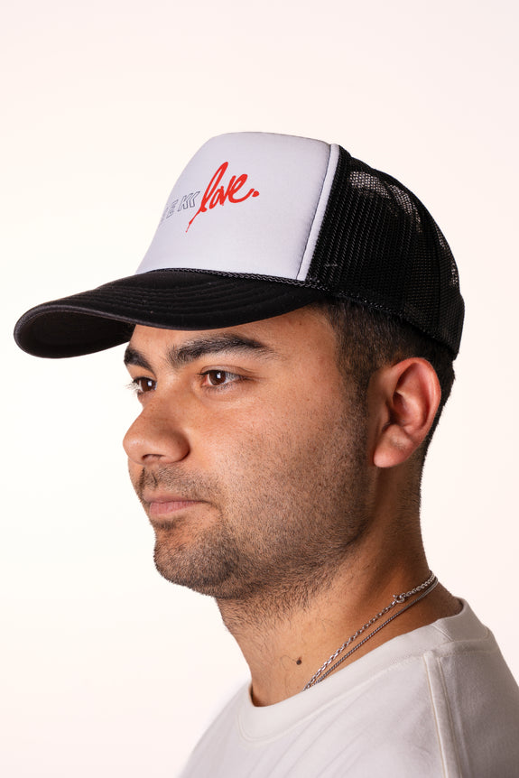 Seek Love Trucker Hat