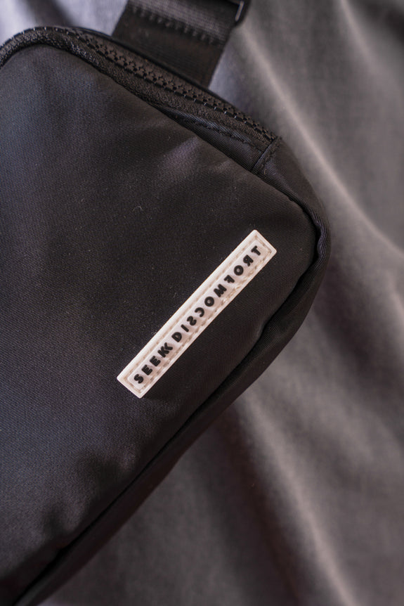 Seek Discomfort Shoulder Bag